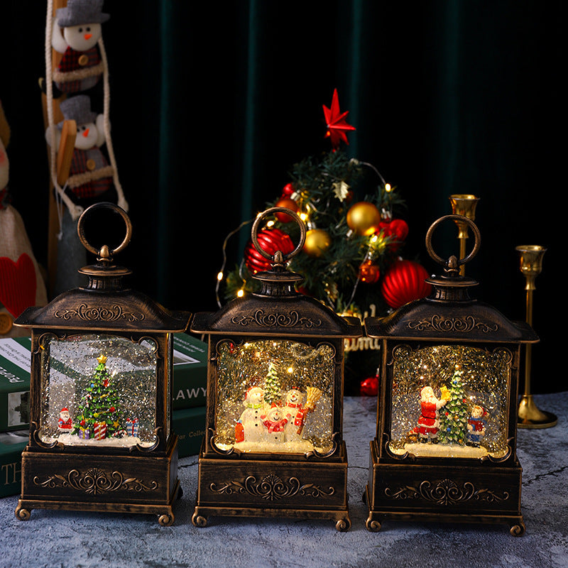 Glitzernde Weihnachtslaterne mit Schneeszenen Karnz