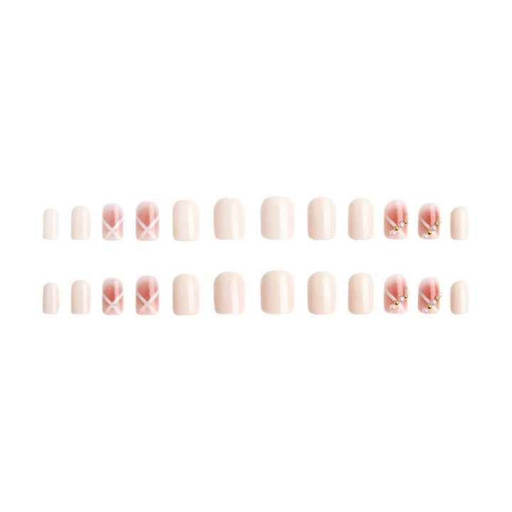 Kunstnagelset mit elegantem und verspieltem Design Karnz
