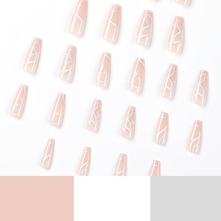 Elegante Nagelverlängerungen mit floralem Design Karnz