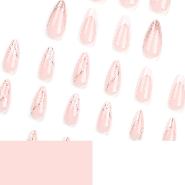 Kunstvolle Stiletto-Nägel mit elegantem Marmor- und Glitzer-Design Karnz