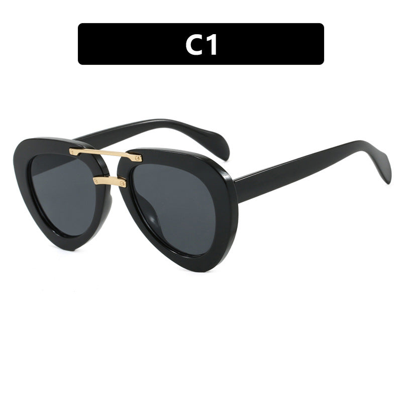 Damen extravagante Sonnenbrille im modernen Herzdesign Karnz