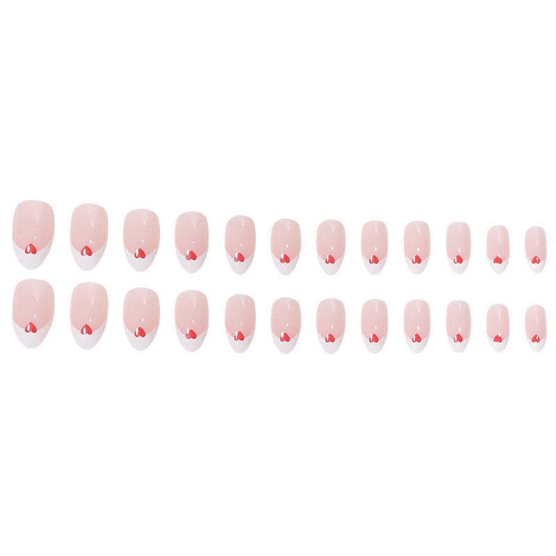 Herzgeschmücktes French Tip Nagelset Karnz