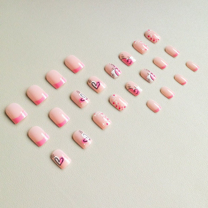 Künstlerisches Nail Art Kit mit Herz- und Funkeldesigns