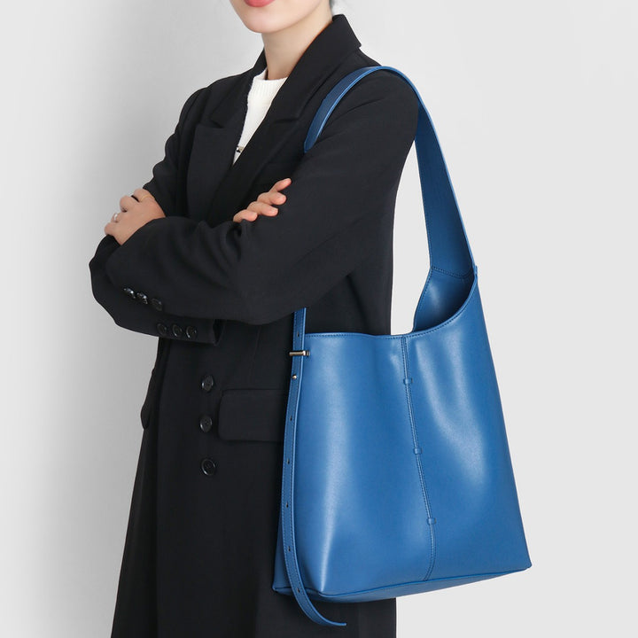Elegante gebogene Bucket-Hobo-Tasche mit verstellbarem Seitengurt