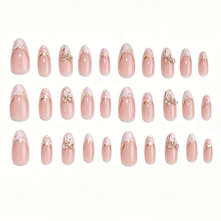 Stiletto Kunstnagelset mit eleganten goldenen Akzenten Karnz