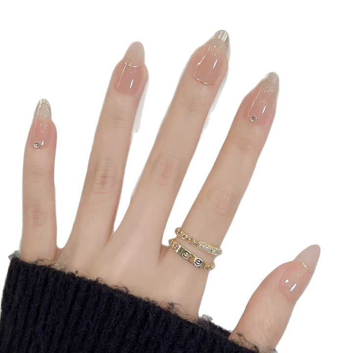 Elegantes Press-On Nagelkunst Set mit schicken French Tips und Edelsteindetails