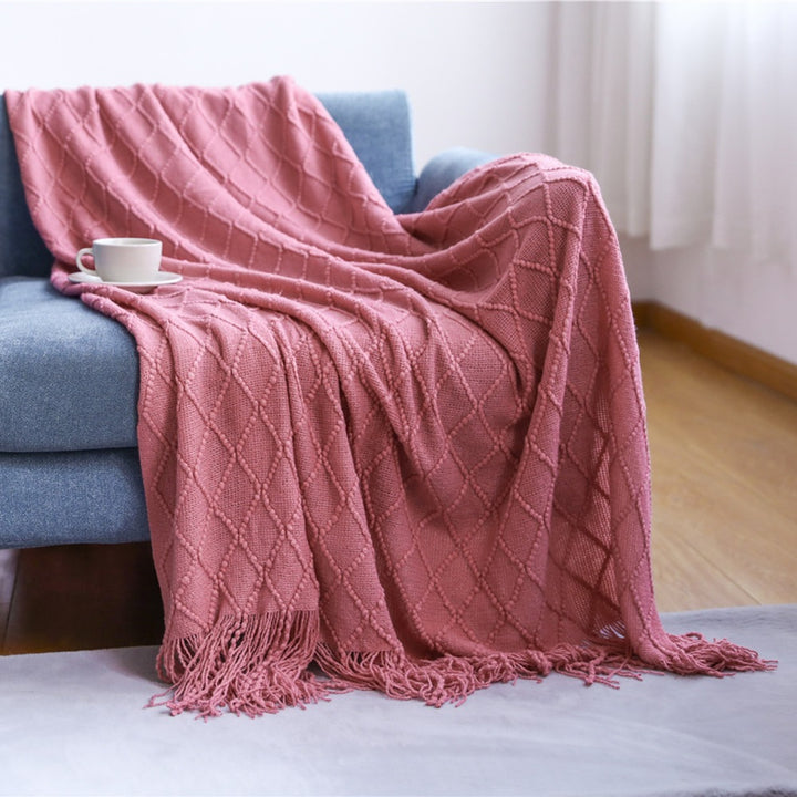 Gemütliche strukturierte gestrickte Wurfdecke