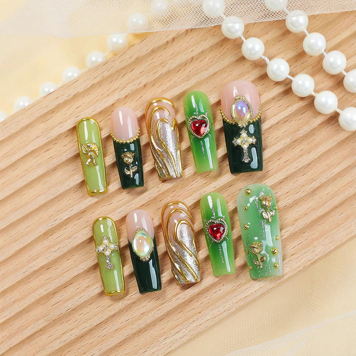 Kunstnagelset mit glamourosem Kristall- und floralem Design Karnz