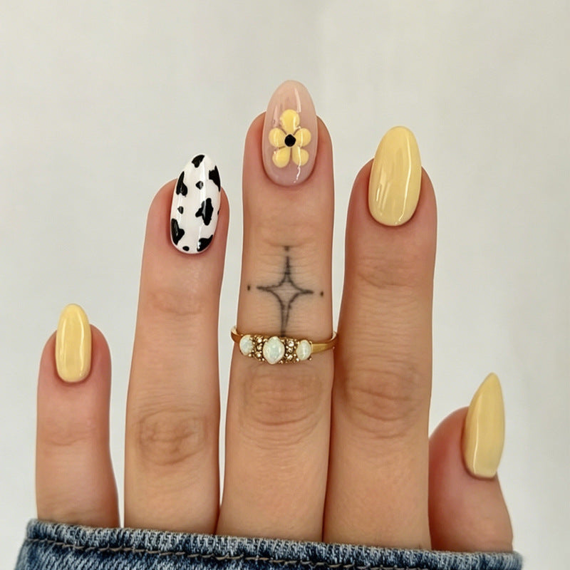 Kunstnagelset mit floralen und trendigen Tiermustern Karnz