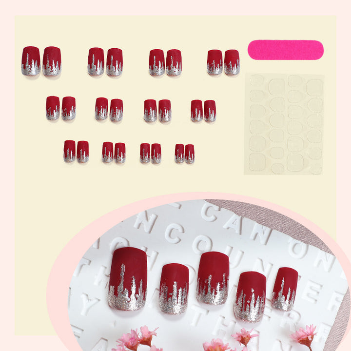 Künstlerisches Press-On Nail Set mit Silber Tropfen Design Karnz