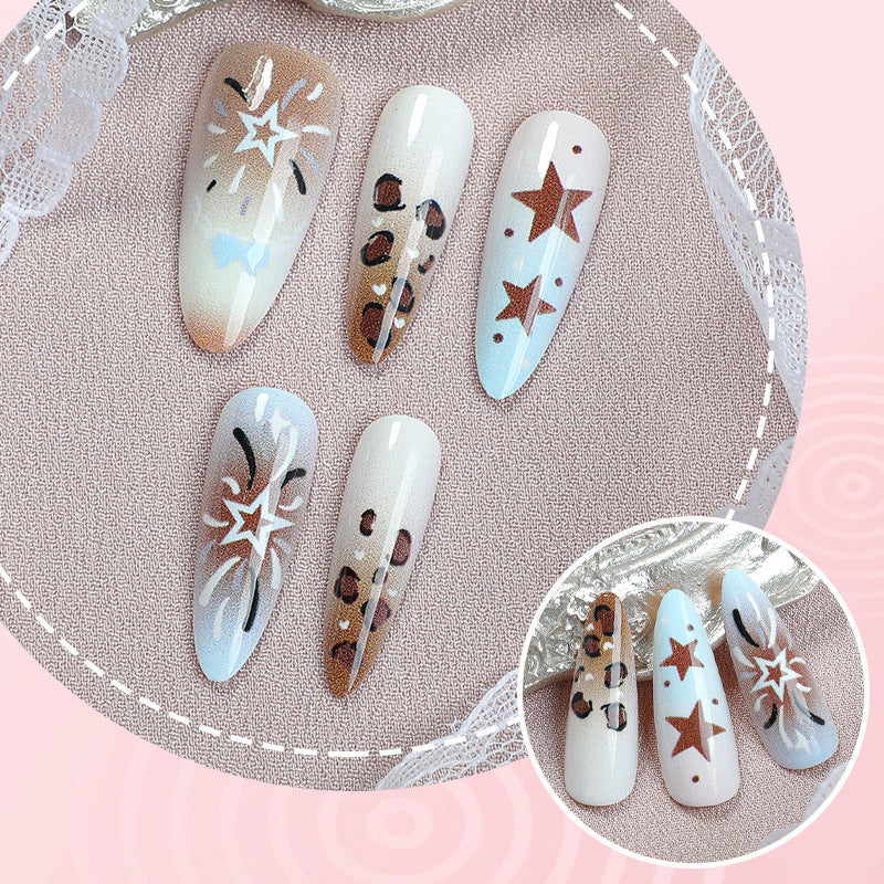 Künstlerisches Press-On Nagelset mit Stern- und Tierdruckdesigns
