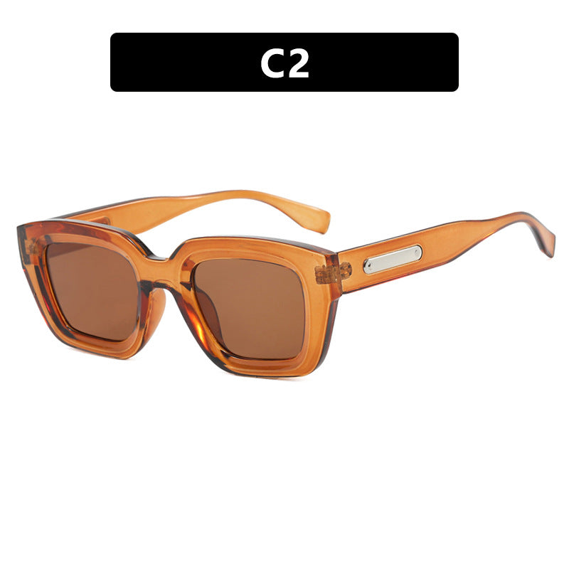 Damen quadratische Sonnenbrille mit transparentem Rahmen und braunen Gläsern Karnz