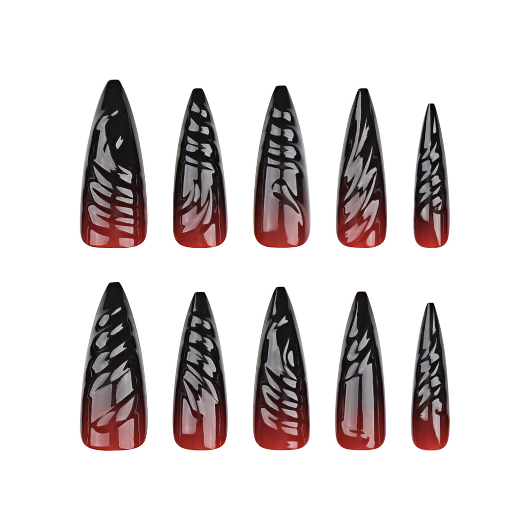 Kreative Stiletto-Nagelkunst mit blutroten Akzenten Karnz