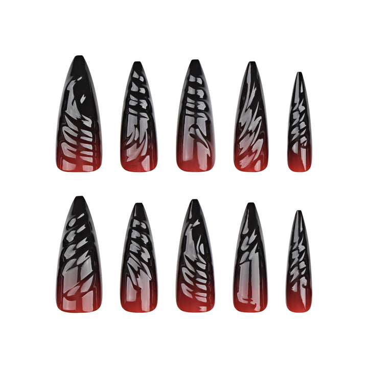 Kreative Stiletto-Nagelkunst mit blutroten Akzenten Karnz