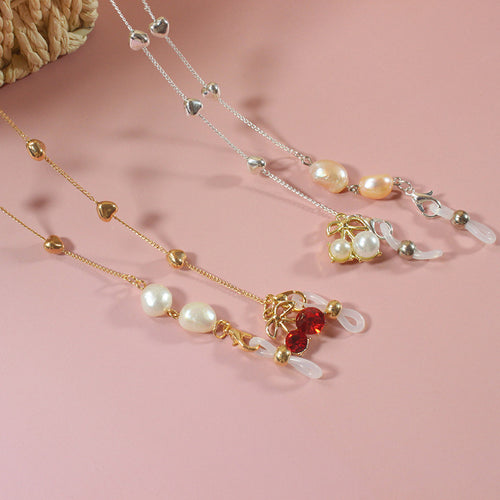 Elegantes Schmuckband mit Perlen und Silbernen Akzenten Karnz