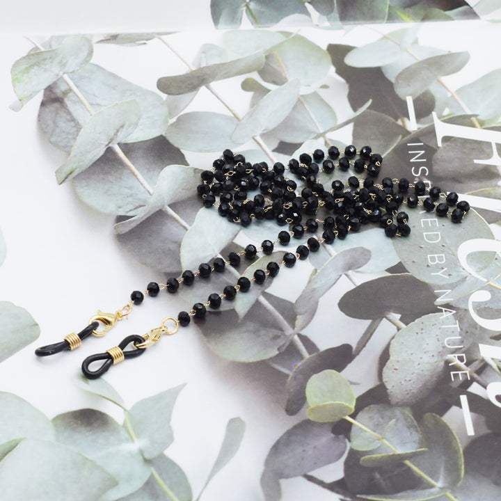 Eleganter mit Blumenakzenten verzierter Brillenketten Karnz