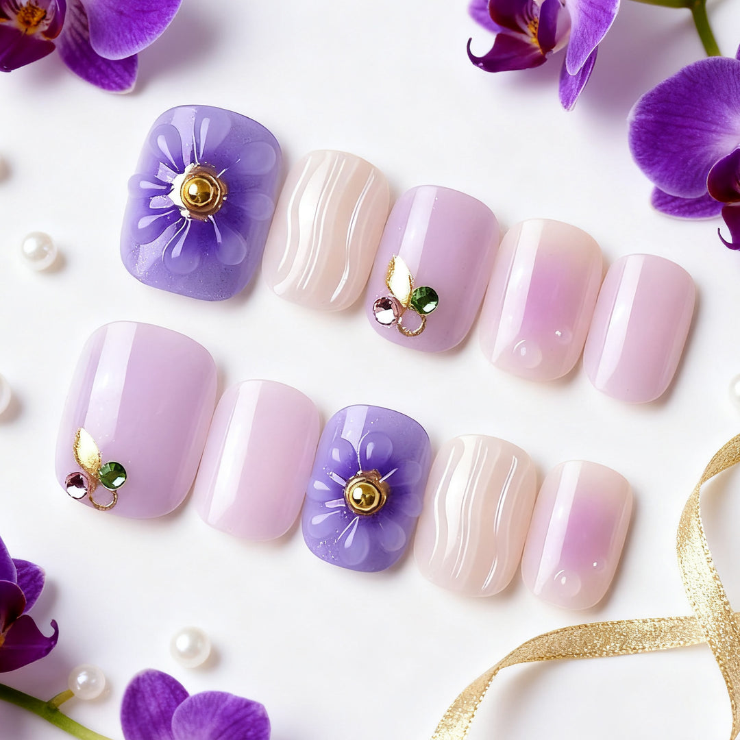 Elegantes dekoratives Press-On-Nagelset mit floralen und Juwelenakzenten Karnz