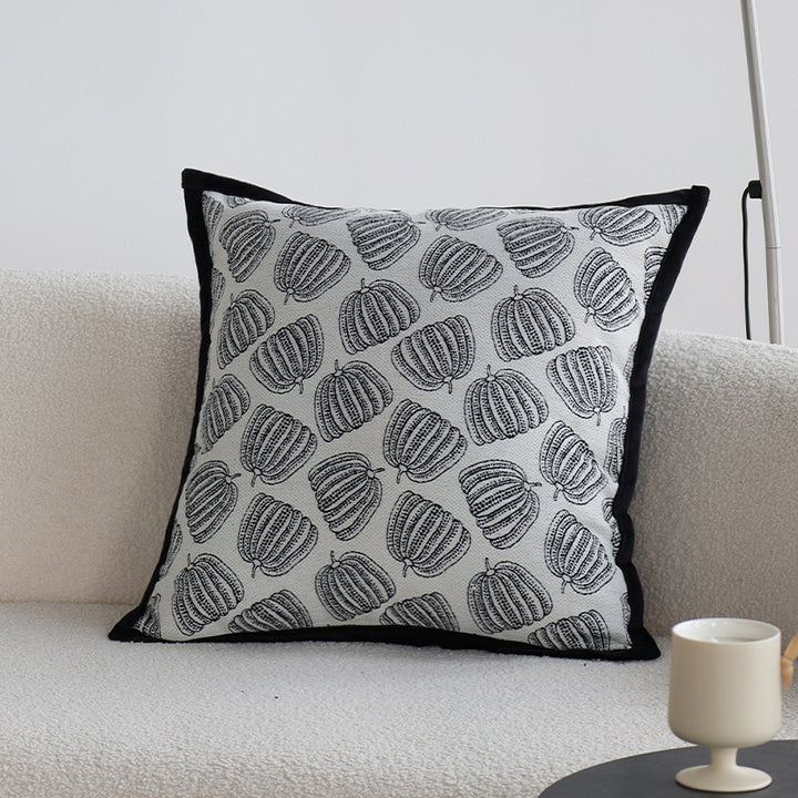 Dekoratives Wohnkissen mit feinem Jacquard-Baumdruck und Samtpaspel Karnz