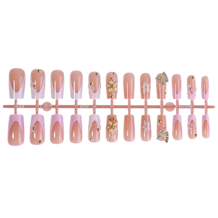 Kunstnagelset mit exklusiven Blüten- und Glitzerelementen Karnz