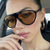 Damen Sportliche Sonnenbrille mit modernem Schutzdesign Karnz