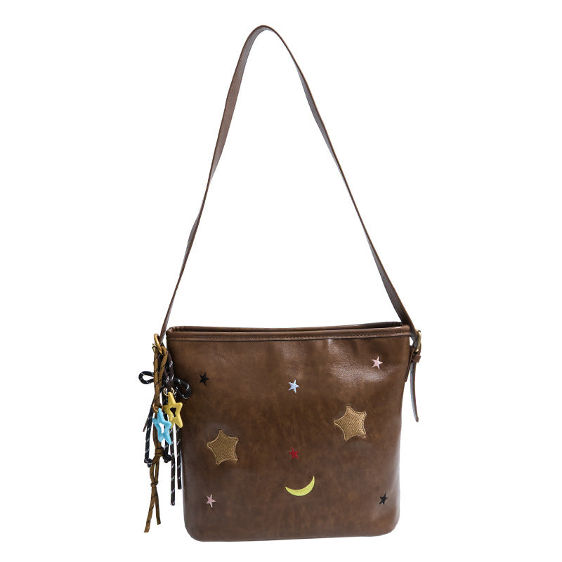 Schultertasche mit Charmanten Applikationen Karnz