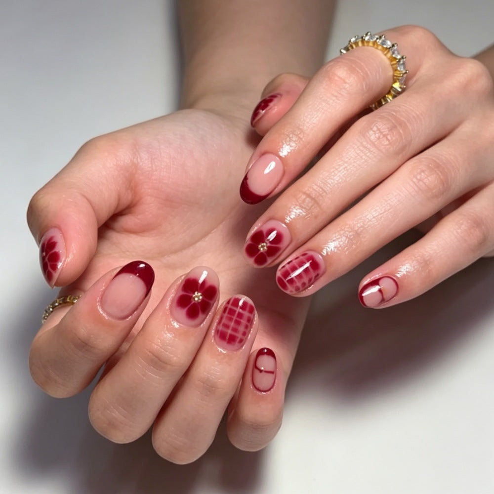 Künstlerische Blumennagelverlängerungen