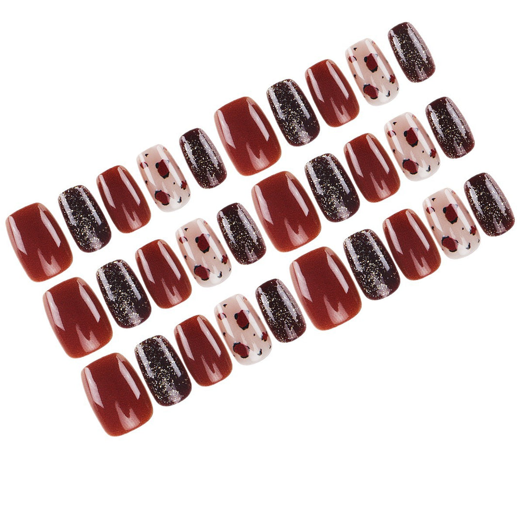 Künstlerisches Press-On-Nagelset mit glitzerndem und gepunktetem Finish Karnz
