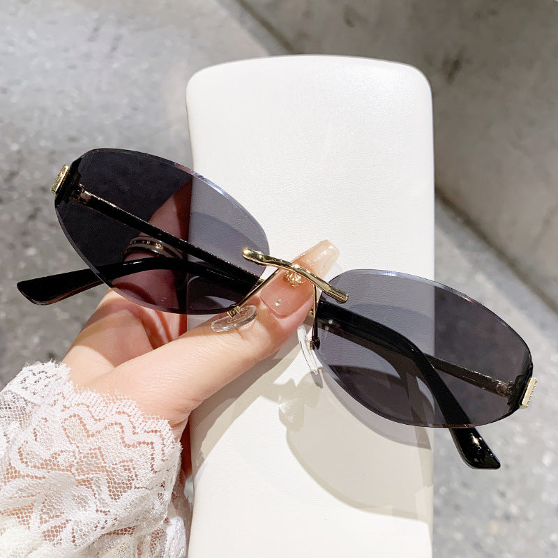 Damen Sonnenbrille im modernen Ovaldesign mit kontrastierendem Rahmen Karnz