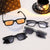 Damen elegante rechteckige Sonnenbrille mit speziellem Rahmen Karnz