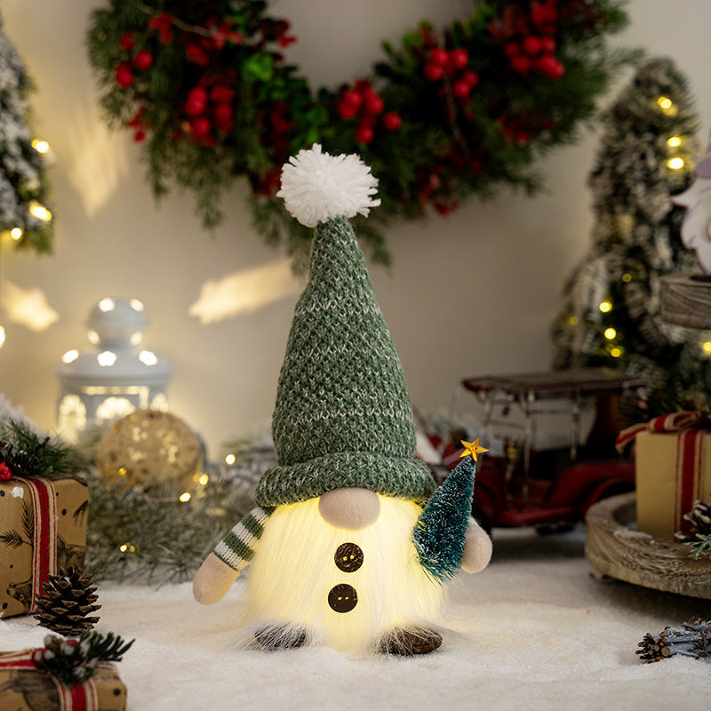 Dekorative Weihnachtsgnom mit leuchtenden Details Karnz