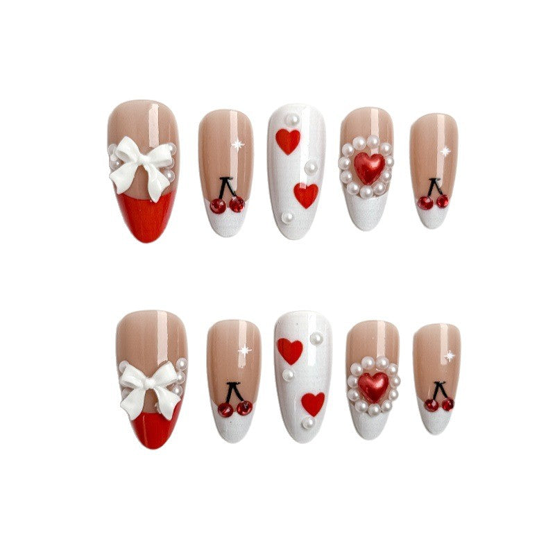 Kreative Nagelkunst mit Herz-und Kirschmotiven Karnz