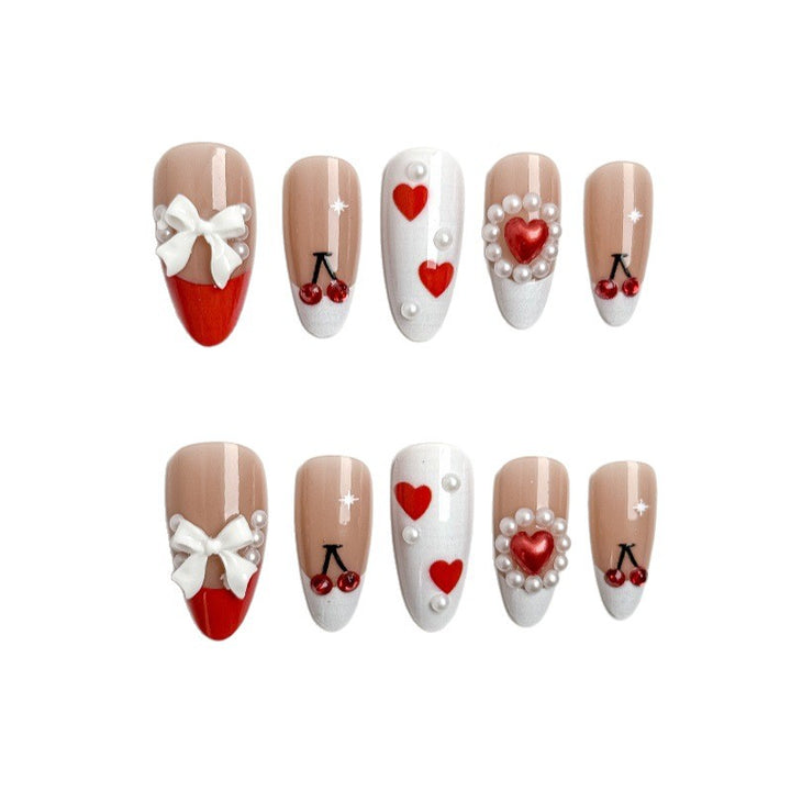 Kreative Nagelkunst mit Herz-und Kirschmotiven Karnz