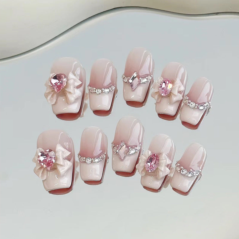 Dekoratives Press-On-Nagelset mit Stern- und Schleifenmotiven Karnz