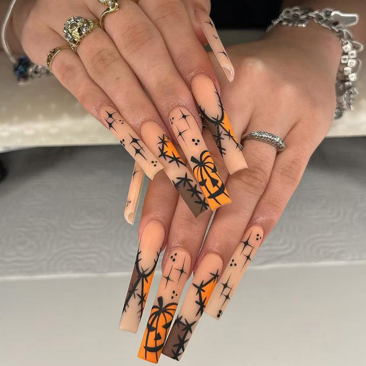 Thematische lange Stiletto Press-On Nägel Karnz