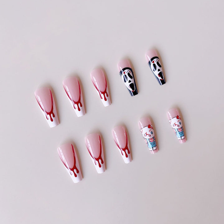 Kunstnagelset mit kreativem Halloween-Design und blutigen Akzenten Karnz