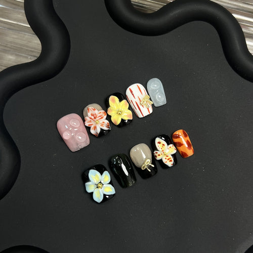 Künstlerische Blumendruck-Press-On-Nagelkollektion