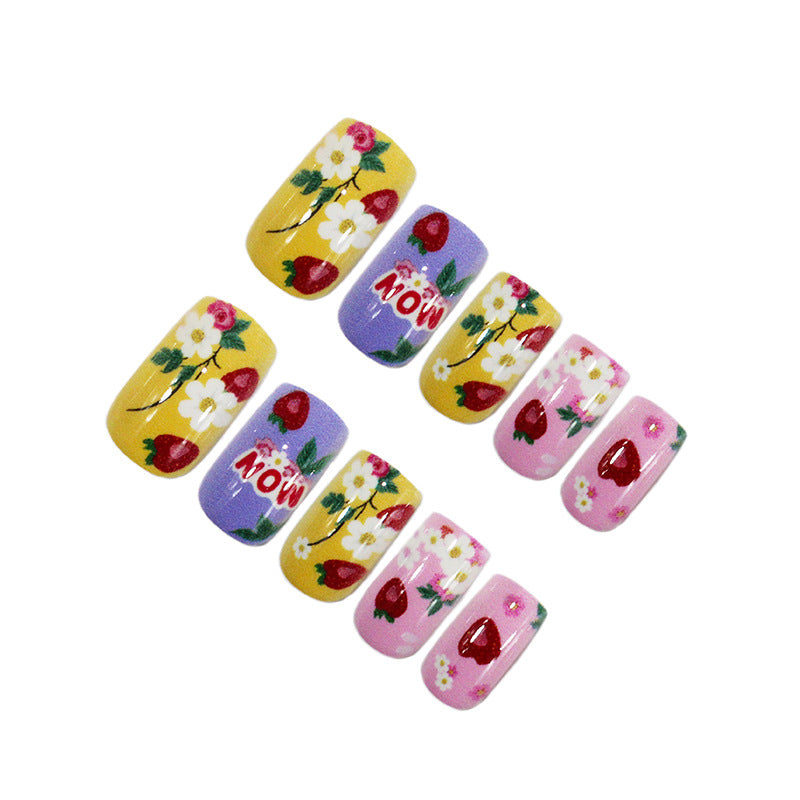 Kunstnagelset mit floralen und fruchtigen Designs Karnz