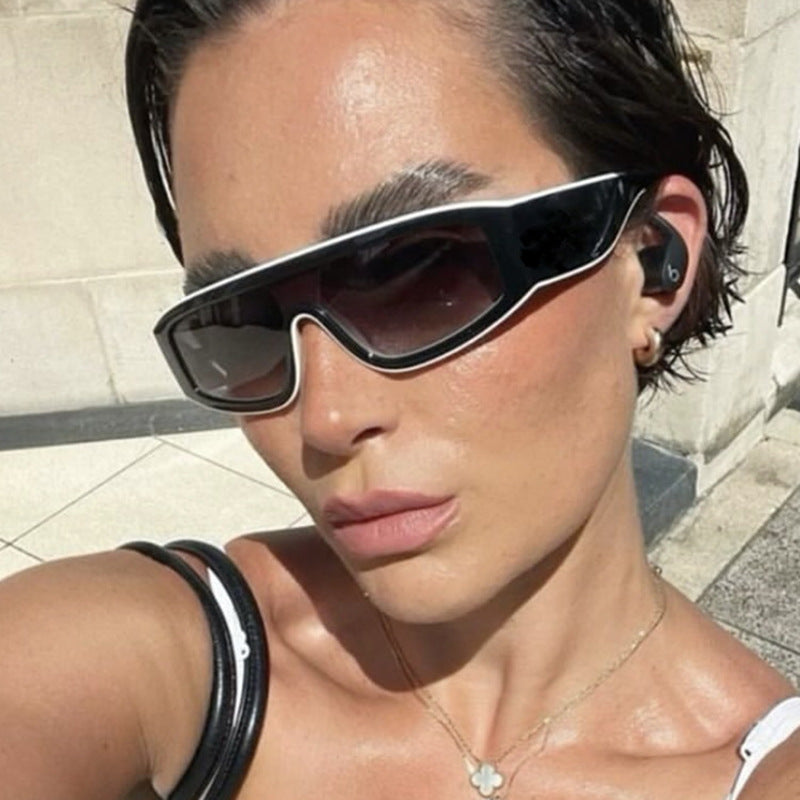 Damen modische Sportsonnenbrille mit innovativem Design und breitem Rahmen Karnz