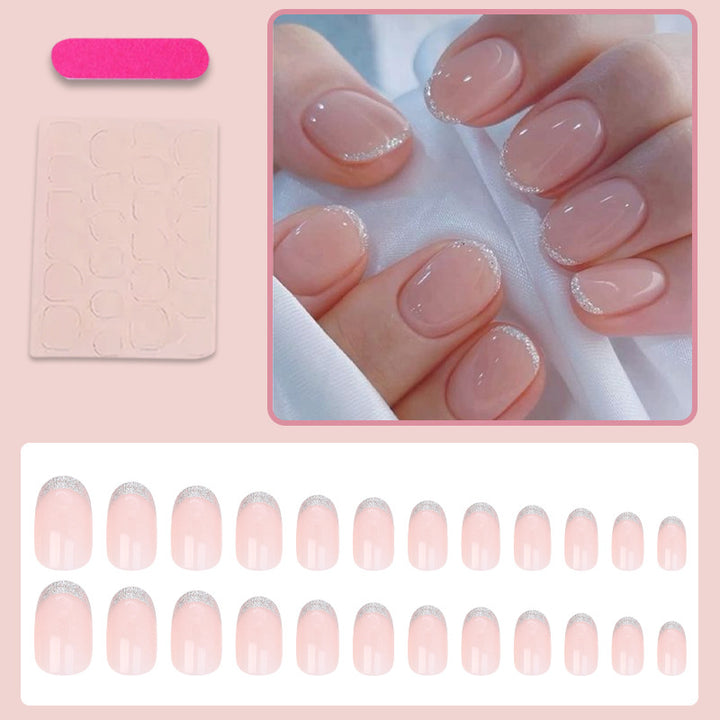 Kunstnagelset mit elegantem French-Tipp und Glitzer-Akzenten Karnz