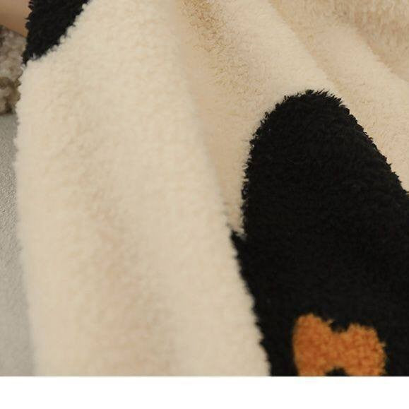 Gemütliche Fleece-Wurfdecke mit bold floralem Design