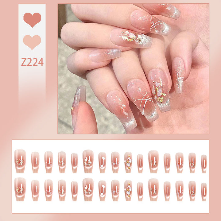 Kunstnagelset mit eleganten Glitzer- und Blumendekoren Karnz