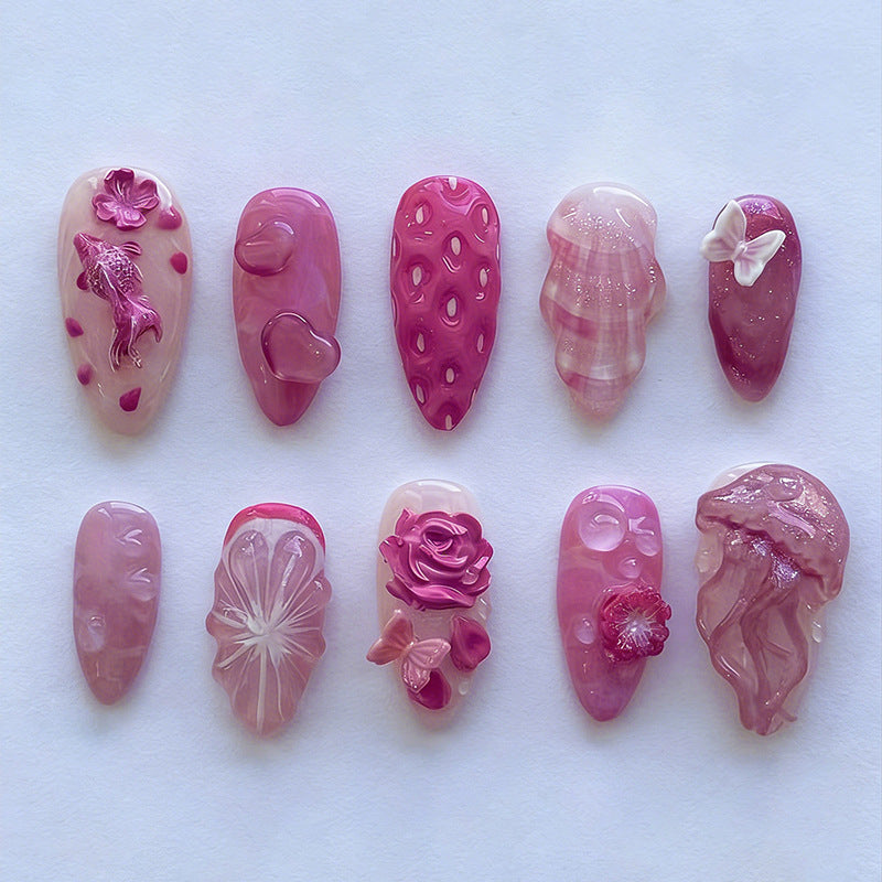 Kunstnagelset mit floralen und maritimen Designs Karnz