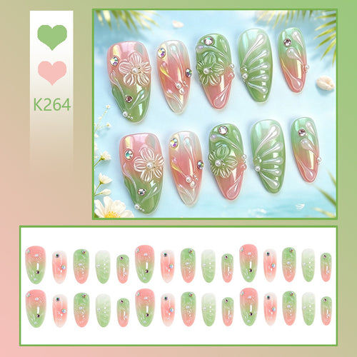 Kunstnagel-Set mit frühlingshaftem Design und Glitzerakzenten Karnz