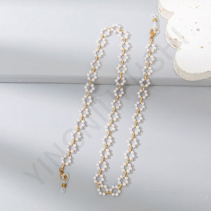 Eleganter Perl- und Goldketten-Brillenhalter Karnz
