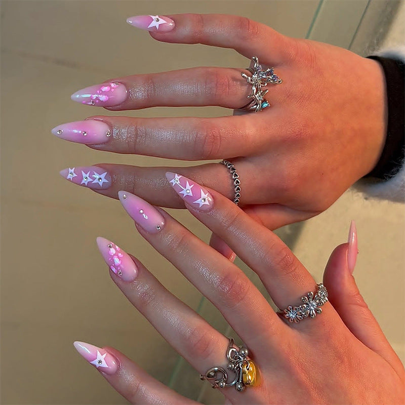 Dekoratives Press-On Nagelkunst-Set mit Stern- und Glitzerakzenten Karnz