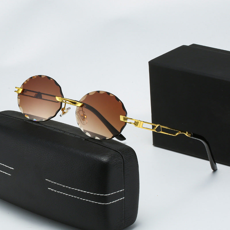 Damen runde Sonnenbrille mit einzigartigem Wellendesign und hochwertigem Metallrahmen Karnz