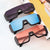Damen Sportliche Shield-Sonnenbrille mit modernem Design Karnz
