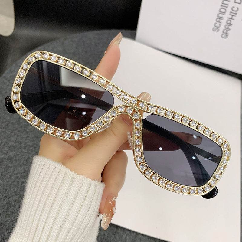 Damen extravagante Cat-Eye Sonnenbrille mit goldenen Akzenten Karnz