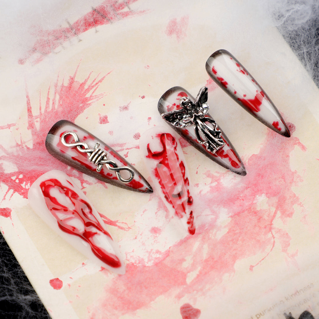 Kunstvolle Stiletto-Nägel mit Blut-und-3D-Design Karnz