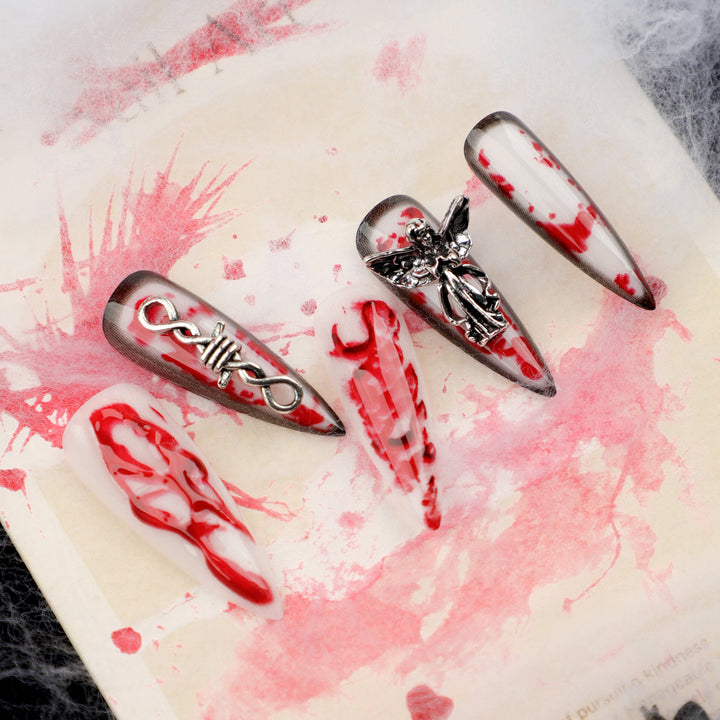 Kunstvolle Stiletto-Nägel mit Blut-und-3D-Design Karnz